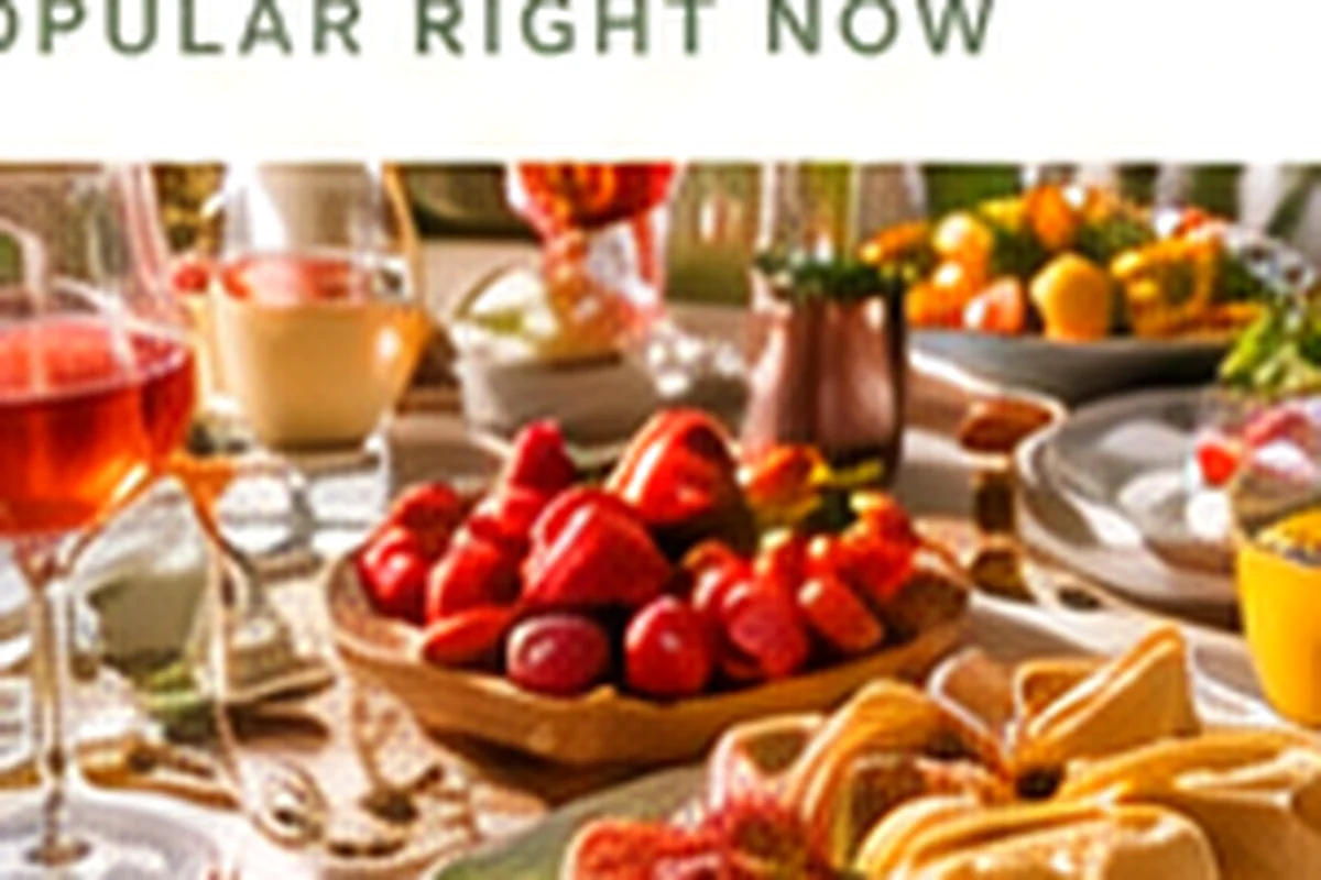 Bright dinner table with food and drinks